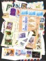 FRANCOBOLLI MONDO - LOTTO/42935 - INSIEME DI OLTRE 500 FRANCOBOLLI MONDIALI SU FRAMMENTO